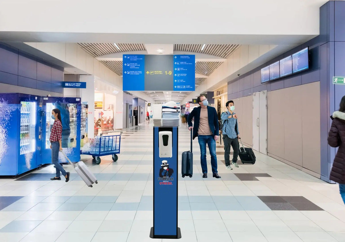 Locking sanitizing kiosk stand in a busy lobby